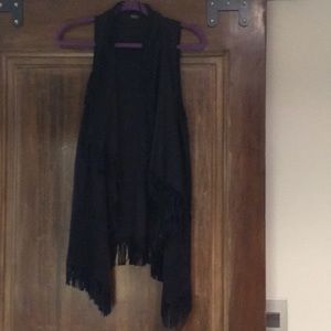 Black fringe vest. One size. Never worn.